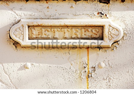 A letterbox build into a wall.  copy space.