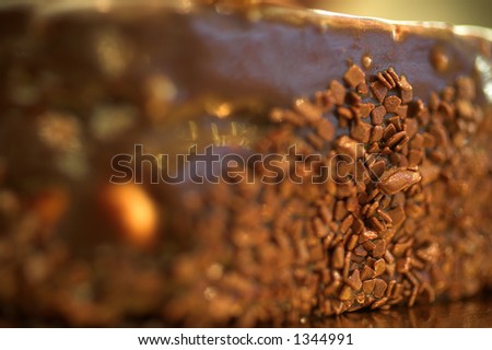 Chocolate flakes on the side of a cake in a French Patisserie and Chocolaterie - Very Shallow Depth of Field, copy space