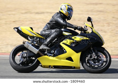 High speed Superbike on the circuit all Logos and Trademarks removed High speed Superbike on the circuit all Logos and Trademarks removed