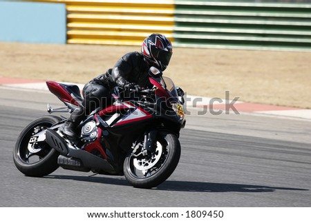 High speed Superbike on the circuit (all Logos and Trademarks removed)