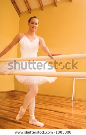Lady doing ballet in a dance studio