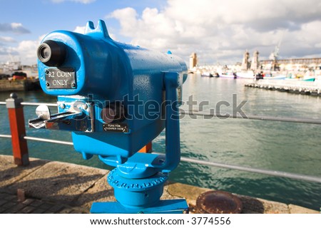 Coin operated view finder or telescope at the Cape Town Waterfront and port area