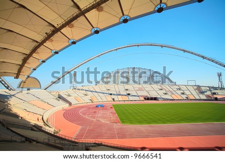 Inside Khalifa sports stadium in Doha, Qatar where the 2006 Asian games were hosted and location for the proposed 2016 Olympic Games (wide angle lens distortion on edges)