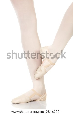 Young caucasian ballerina girl on white background and reflective white floor showing various ballet steps and positions. Petit retire. Not Isolated.