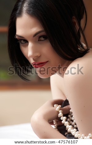 stock photo : Sexy naked young caucasian adult woman with red lips, short black hair