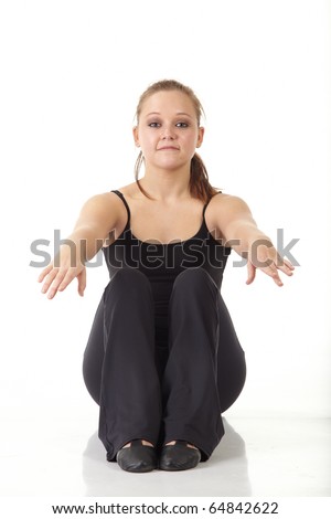 Young caucasian Modern Jazz dancer in a black top and black pants on a white background displaying various positions. NOT ISOLATED