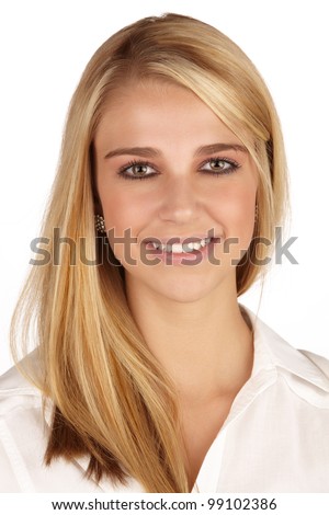 Young adult caucasian woman with long blonde hair and green eyes wearing a plain white shirt with flawless skin and natural makeup.