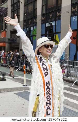 NEW YORK, NY - MAY 18: Grand Marshal of New York Dance Parade Jacqulyn Buglisi cheers  public during 7th Dance Parade on May 18, 2013 in New York City.