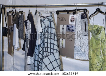 NEW YORK - SEPTEMBER 8: Rack with dress on backstage for Lela Rose Spring/Summer 2014 collection at Mercedes-Benz  Fashion Week at Studio at Lincoln Center on September 8, 2013 in NYC
