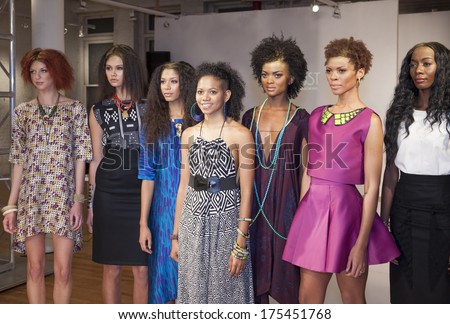 NY, NY - FEB 07, 2014: Designer Tabii Just poses with models on Zero Squared  Fall/ Winter 2014 Presentation by Tabii Just during MBFW at Launch NYC presented by Manufacture New York.