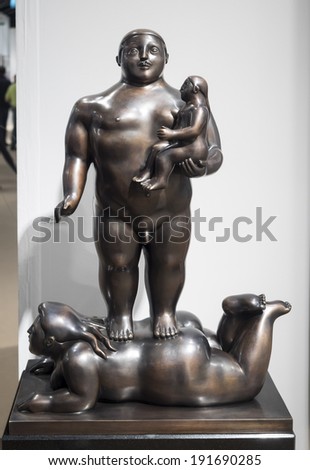 New York, NY, USA - May 8, 2014: \'Man, Woman, Child \' bronze sculpture by Fernando Botero at Downtown Fair 2014 presented by Contessa Gallery on Downtown Armory in New York City.