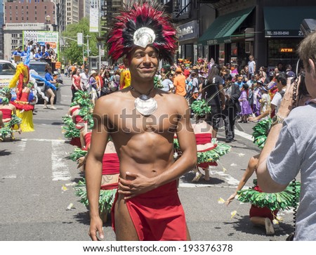 New York, NY, USA - May 17, 2014: Member of Polynesian Aveia Dance group poses at The 8th Annual New York City Dance Parade and Festival
