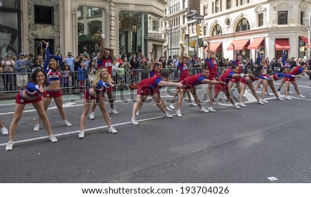 New York, NY, USA - May 17, 2014: Members of Cheer New York dance group perform at The 8th Annual New York City Dance Parade and Festival