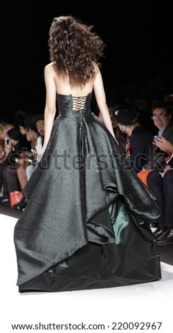 New York, NY, USA - September 11, 2014: Model walks runway wearing MTCostello at Art Hearts fashion show presented by AIDS Healthcare Foundation during MBFW SS2015 at The Theatre at Lincoln Center