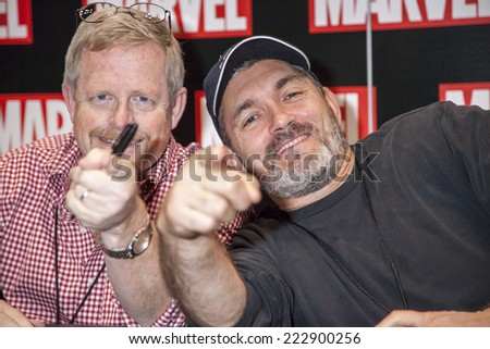 New York, NY, USA - October 11 2014: Marvel artists Ron Garney(R) and Marc Bagley attend Comic Con 2014 at The Jacob K. Javits Convention Center in New York City
