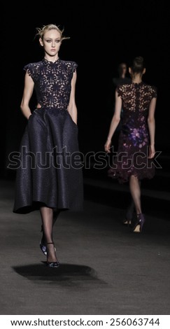 New York, NY, USA - February 13, 2015: A model walks runway for Monique Lhuillier Fall 2015 Runway show during Mercedes-Benz Fashion Week New York at the Theatre at Lincoln Center, Manhattan