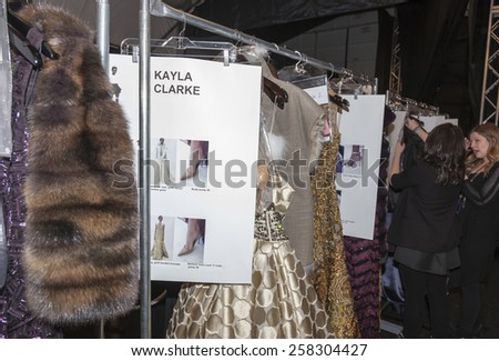 New York, NY, USA - February 16, 2015: Rack with dresses on backstage for Dennis Basso Fall 2015 Runway show during Mercedes-Benz Fashion Week New York at the Theatre at Lincoln Center, Manhattan