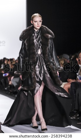 New York, NY, USA - February 16, 2015: A model walks runway for Dennis Basso Fall 2015 Runway show during Mercedes-Benz Fashion Week New York at the Theatre at Lincoln Center, Manhattan