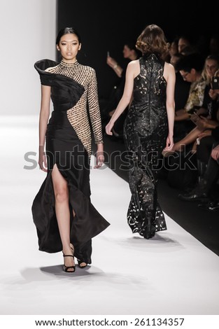 New York, NY, USA - February 19, 2015: Model walks runway for Mimi Tran Fall 2015 collection at Art Hearts Fashion Presented By AHF during Mercedes-Benz Fashion Week at The Theatre at Lincoln Center