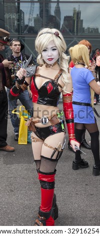 New York, NY, USA - October 9, 2015: Comic Con attendees pose in the costumes during Comic Con 2015 at The Jacob K. Javits Convention Center in New York City.