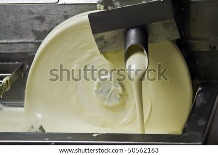 White vanilla flavor chocolate machine to produce a vanilla fudge.