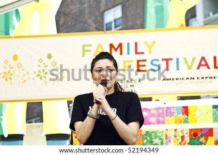NEW YORK - MAY 01: Actress Jennifer DiNoia preforms \'Wicked\' onstage at the Family Festival Street Fair during the 2010 Tribeca Film Festival on May 1, 2010 in NYC