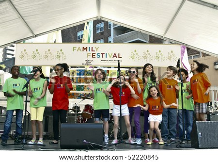 NEW YORK - MAY 01: A kids choir performs on the stage on Family Festival Street Fair during the 2010 Tribeca Film Festival on May 1, 2010 in NYC
