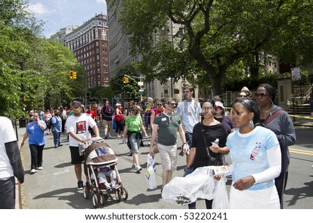 NEW YORK - MAY 16: People participating to the AIDS Walk 2010 walking down Riverside Drive on May 16, 2010 in New York City.