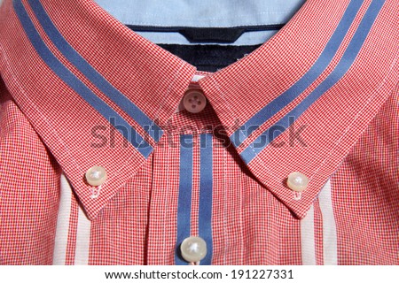 Red man shirt button down collar with blue and white stripes