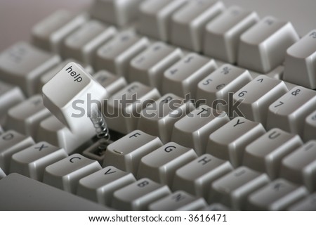 Help key jumping out of keyboard with a spring. Some motion on the key.
