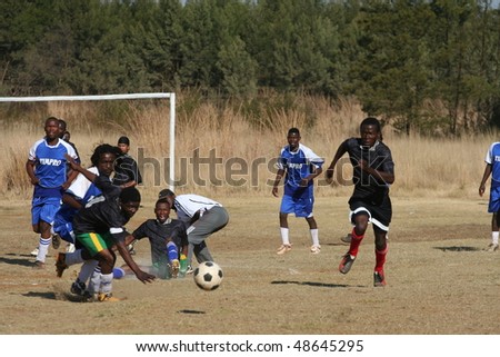 PRETORIA, SOUTH AFRICA - FEBRUARY 6: Local teams B-House and Timpro in a friendly match. Soccer fever is running high with the world cup only weeks away. February 6, 2010 in Pretoria, South Africa