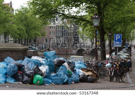 AMSTERDAM, THE NETHERLANDS - MAY 15: Garbage pile up during the week long workers strike that ended today May 15, 2010, in Amsterdam, The Netherlands