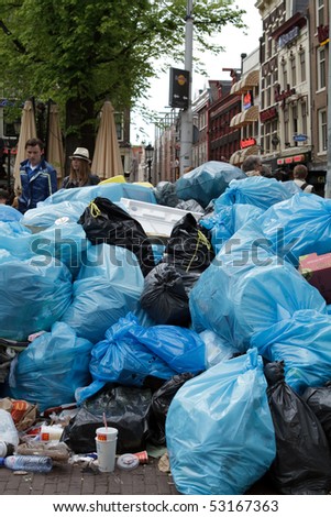 AMSTERDAM, THE NETHERLANDS - MAY 15: Garbage pile up during the week long workers strike that ended today May 15, 2010, in Amsterdam, The Natherlands