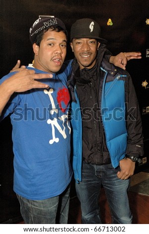 NEW YORK - DECEMBER 1 - Celebrity photographer Johnny Nunez[L] and Datwon Thomas [R] arrives at the New Era launch party for Johnny Nunez Limited Edition 59FIFTY CAP at the New Era Flagship store in New York on December 1, 2010.