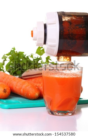Juice extractor and carrot isolated white kitchen prepare