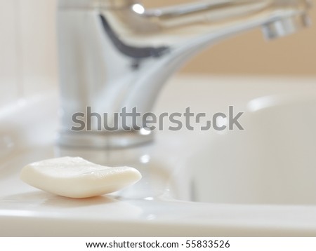 Bathroom interior with white sink and faucet - mixer tap