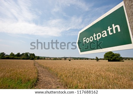 Footpath sign marking a public path in the UK countryside