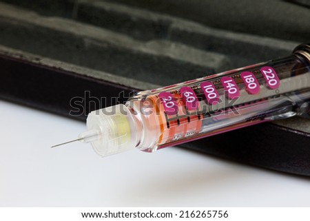 Insulin injection needle, or pen, for use by diabetics. Logos removed