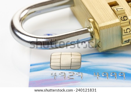 Close up of a credit or debit card with padlock. Card security concept. Card account number changed for security purposes.