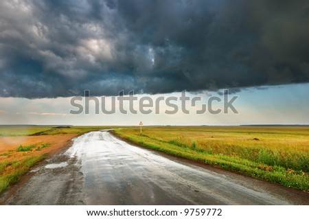 Landscape with road and storm clouds