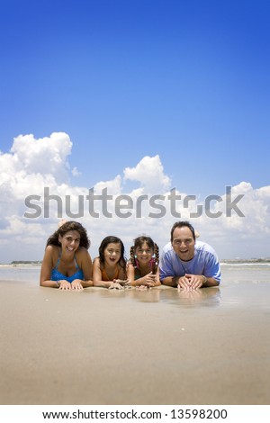 Family on vacation having fun in the sun