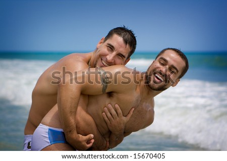 stock photo Two gay men at the beach