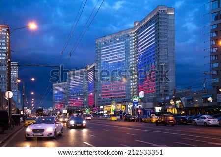 MOSCOW, RUSSIA - AUGUST 23, 2014: Buildings at New Arbat Street at evening. Illuminations in honor of the National Flag of the Russian Federation