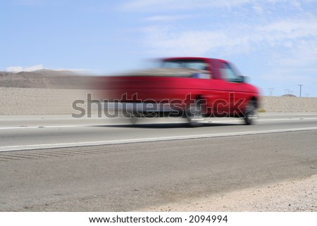 Car blurred with speed