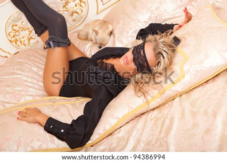 stock photo top view picture of sexy blindfolded girl in black lingerie 