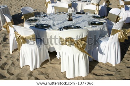 stock photo Dinner table at a beach wedding