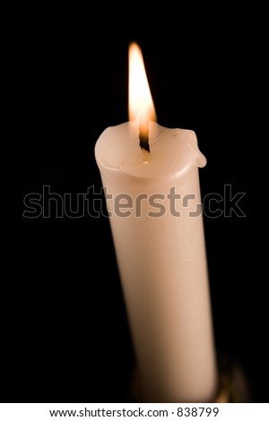 A picture of a burning candle looking down from the top.