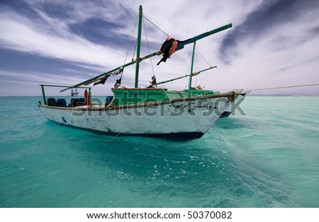 Lonely fishing boat in the Red sea
