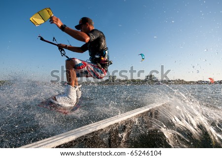young kiter slides on rail at jib contest