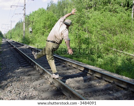 The person falling from a rail